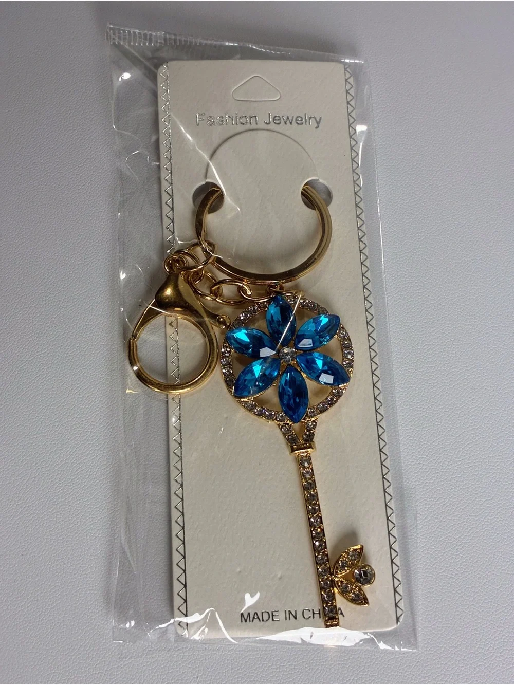 Gold Key Crystal Keychain with Bright Blue Flower Petals Accent New Without Tags